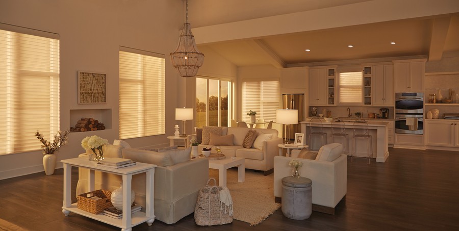 Modern living room with motorized shades automatically adjusting to block out afternoon sun.